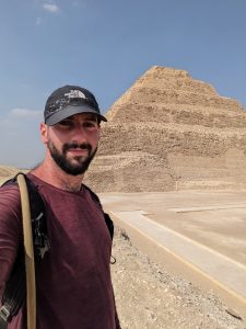 Levi outside the Stepped Pyramid of Djoser. The very first pyramid!